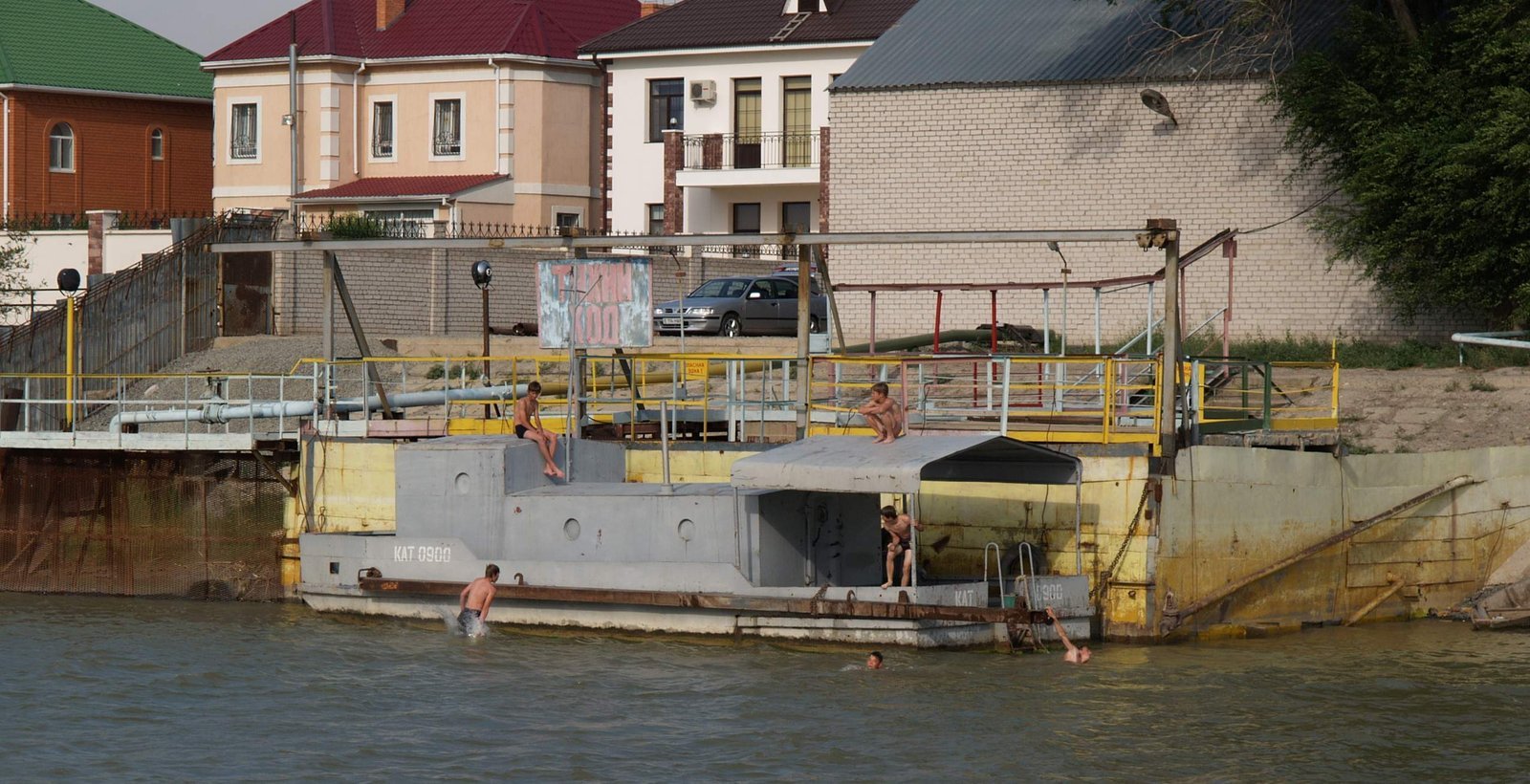 Children on boat in river, CACENA